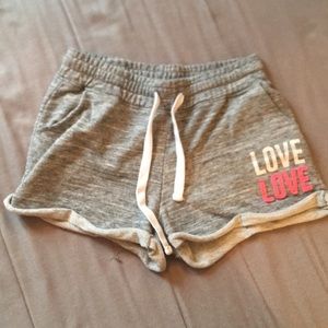 gray shorts with love decal